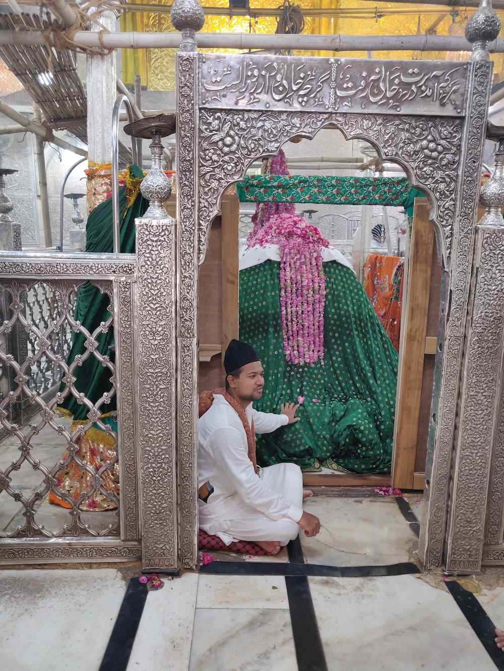Flower offering at the holy threshold